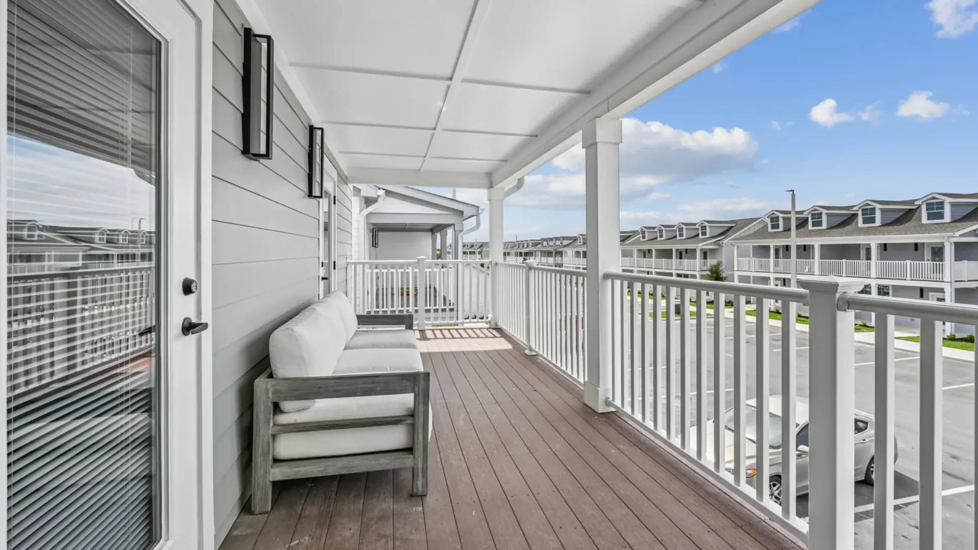 Private covered balcony at a Pointe Grand townhome
