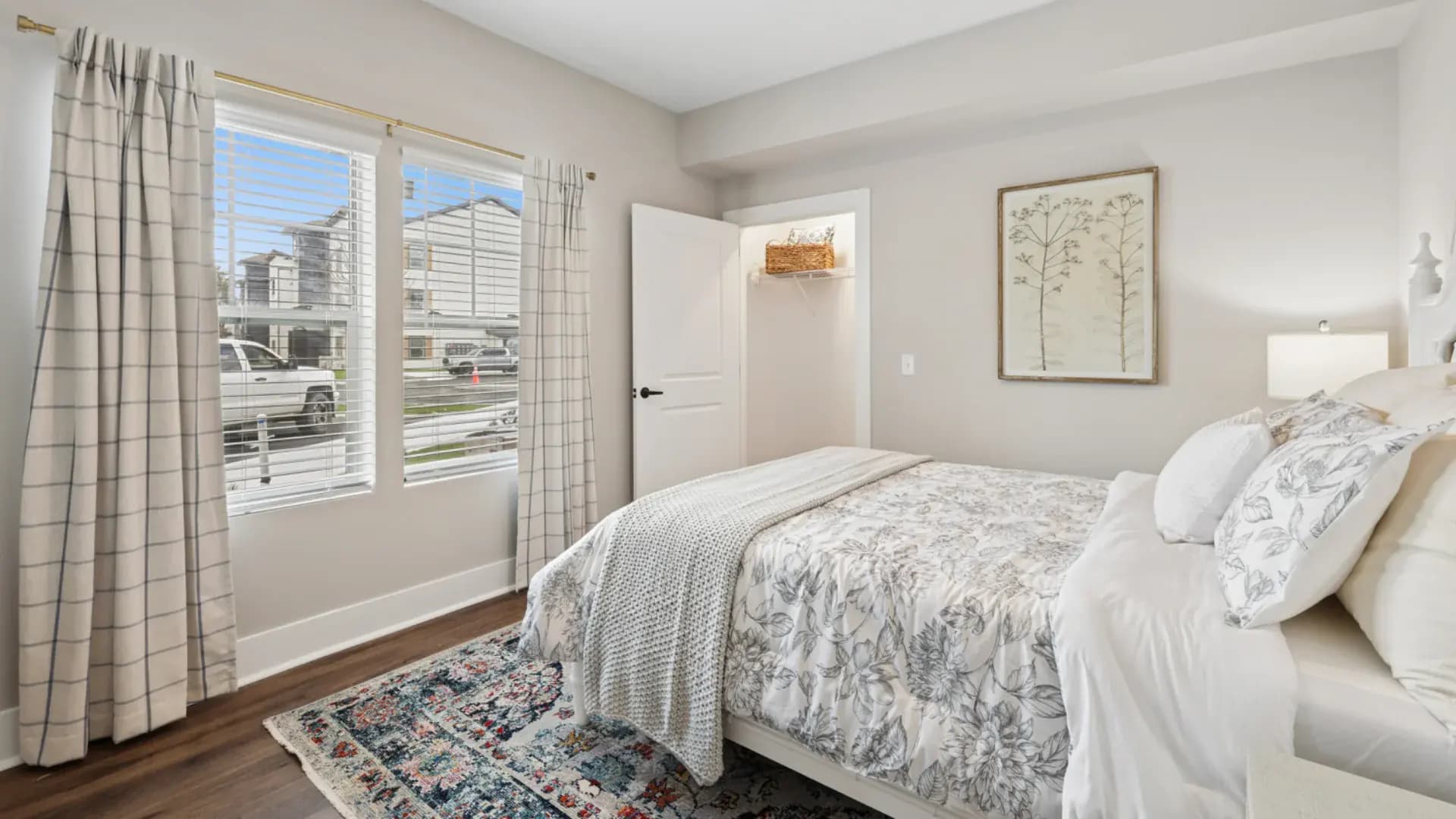 Bedroom in a Pointe Grand apartment home