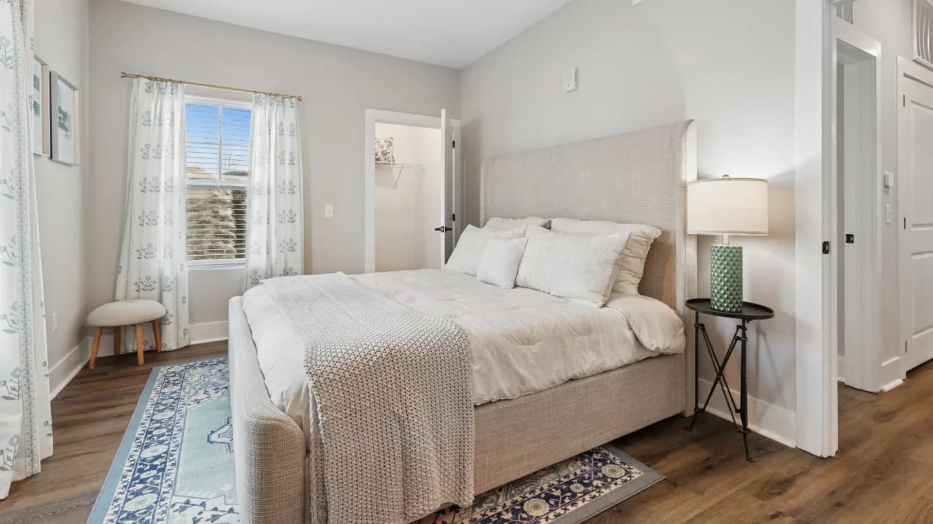 Bedroom in a Pointe Grand apartment home