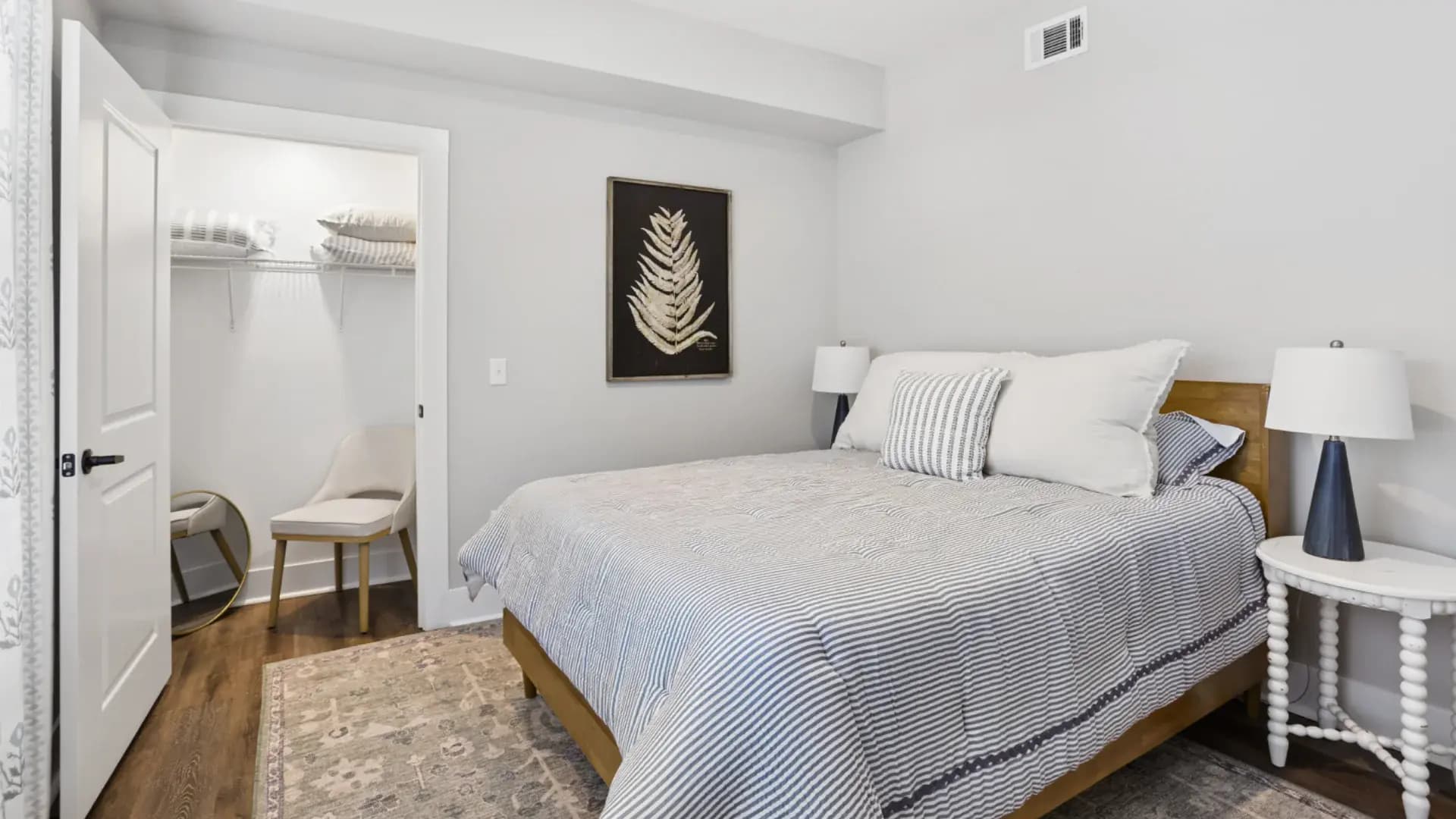 Bedroom in a Pointe Grand apartment home