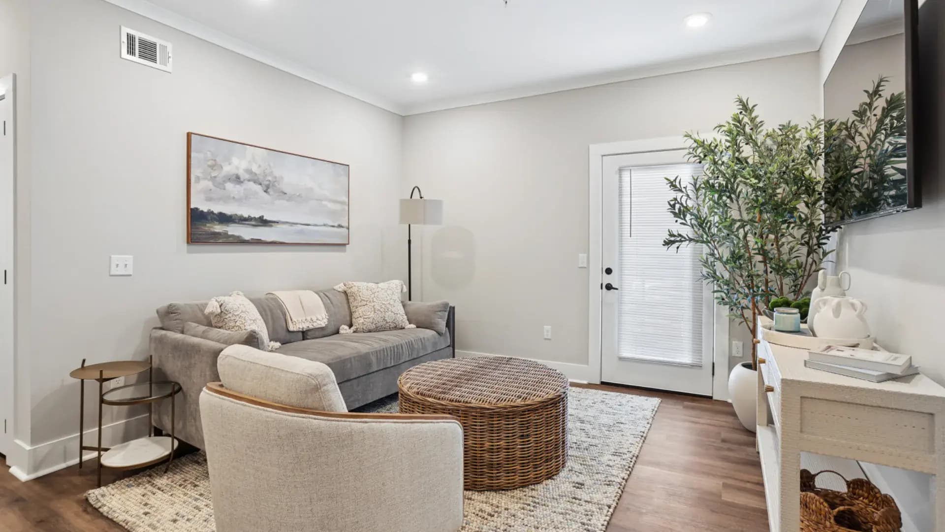Living room in a Pointe Grand apartment home