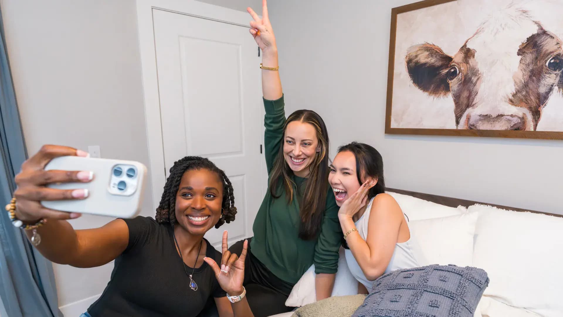 Residents at home in a Pointe Grand apartment bedroom