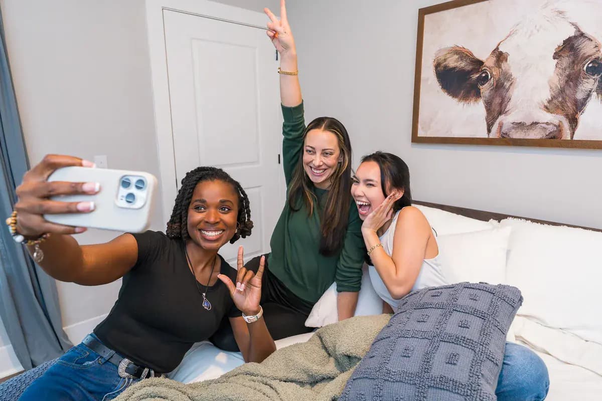 Residents at home in a Pointe Grand apartment bedroom