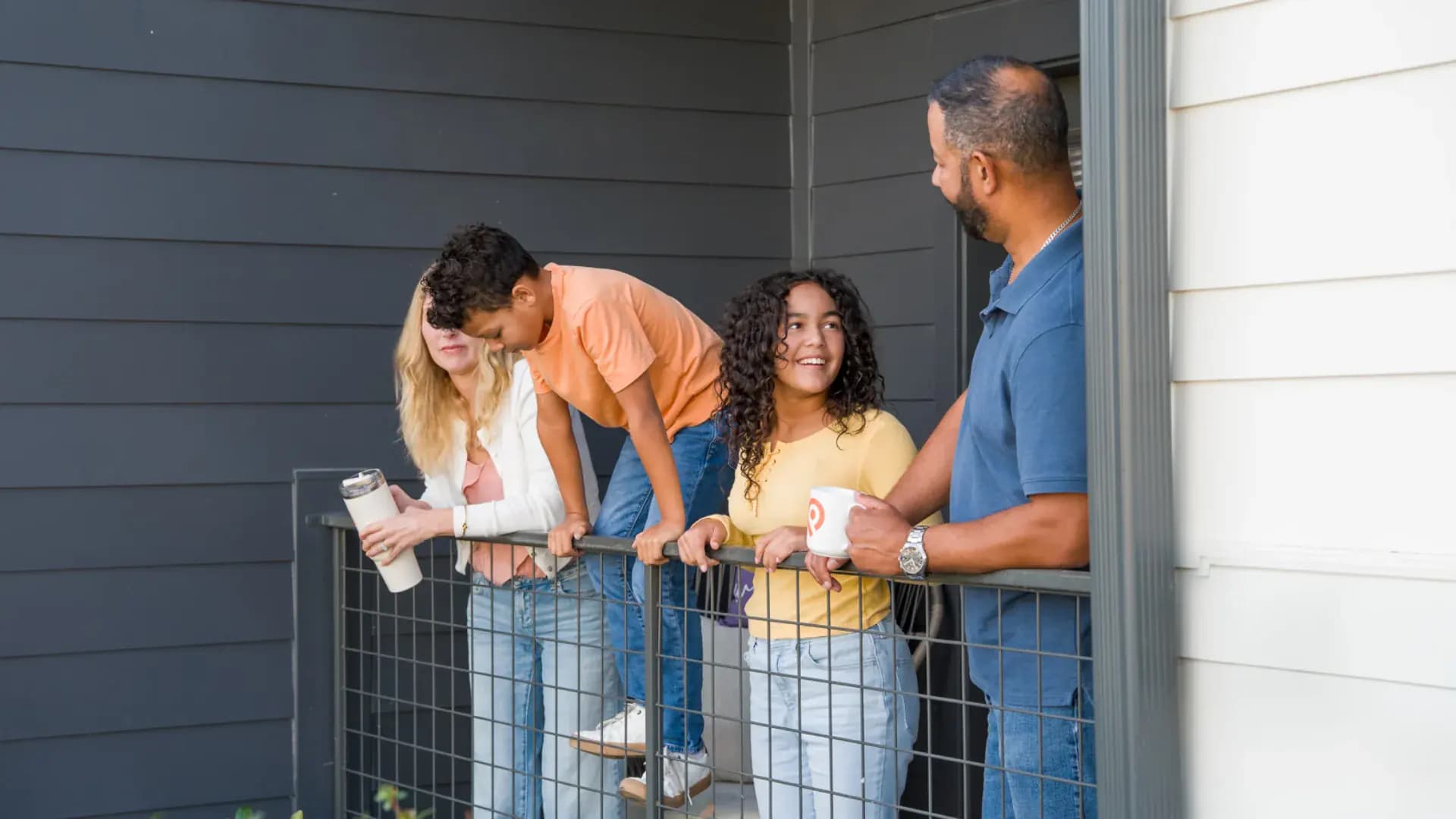 Residents on the patio at a Pointe Grand community